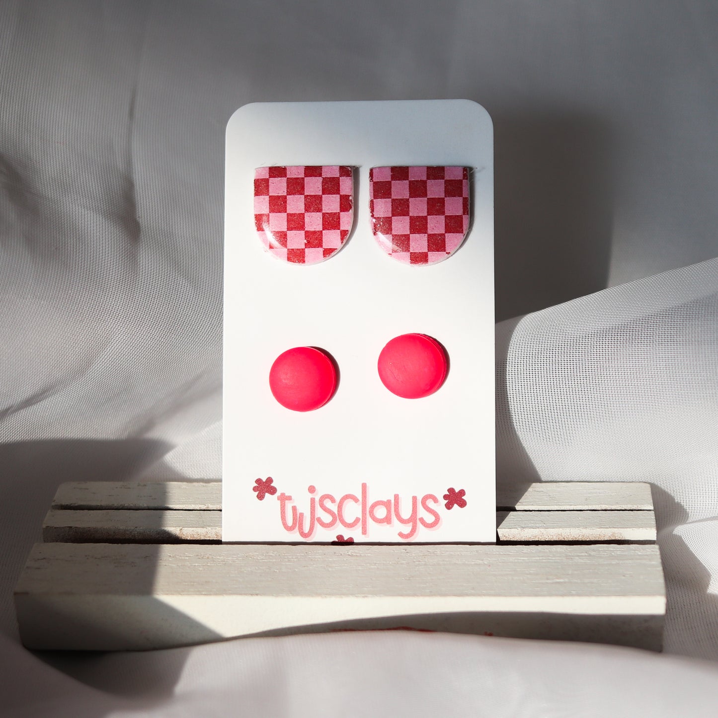 stud set: checker arches + pink polka dots